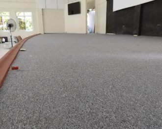 Transforming stages with Stylish Carpet Tile Installation: Quezon Project